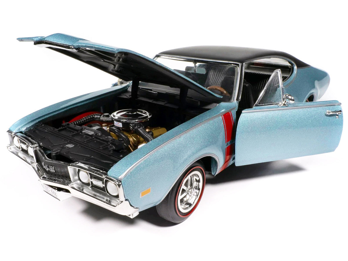 1968 Oldsmobile 442 W30 Holiday Coupe Teal Frost Metallic with Red Stripes and Black Vinyl Top "Hemmings Motor News July 2023 Cover Car" "American Muscle" Series 1/18 Diecast Model Car by Auto World