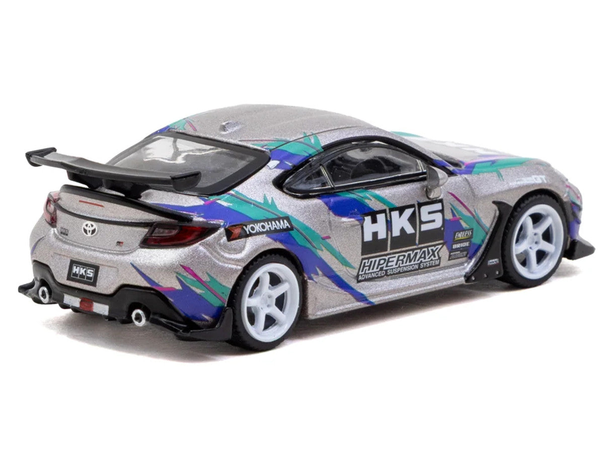 Toyota GR86 RHD (Right Hand Drive) "HKS" Gray Metallic with Graphics and Metal Oil Can Packaging "Global64" Series 1/64 Diecast Model Car by Tarmac Works