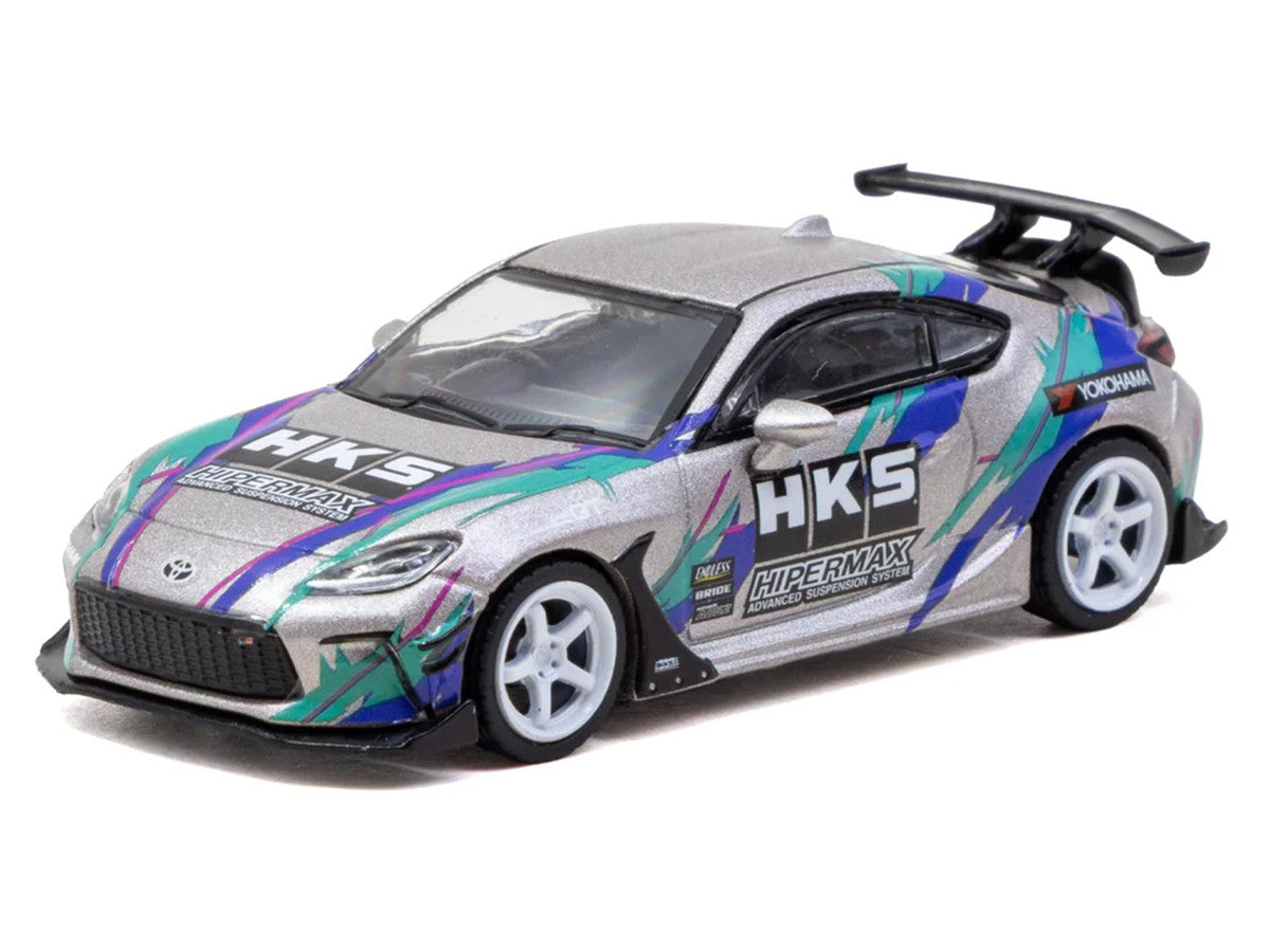 Toyota GR86 RHD (Right Hand Drive) "HKS" Gray Metallic with Graphics and Metal Oil Can Packaging "Global64" Series 1/64 Diecast Model Car by Tarmac Works